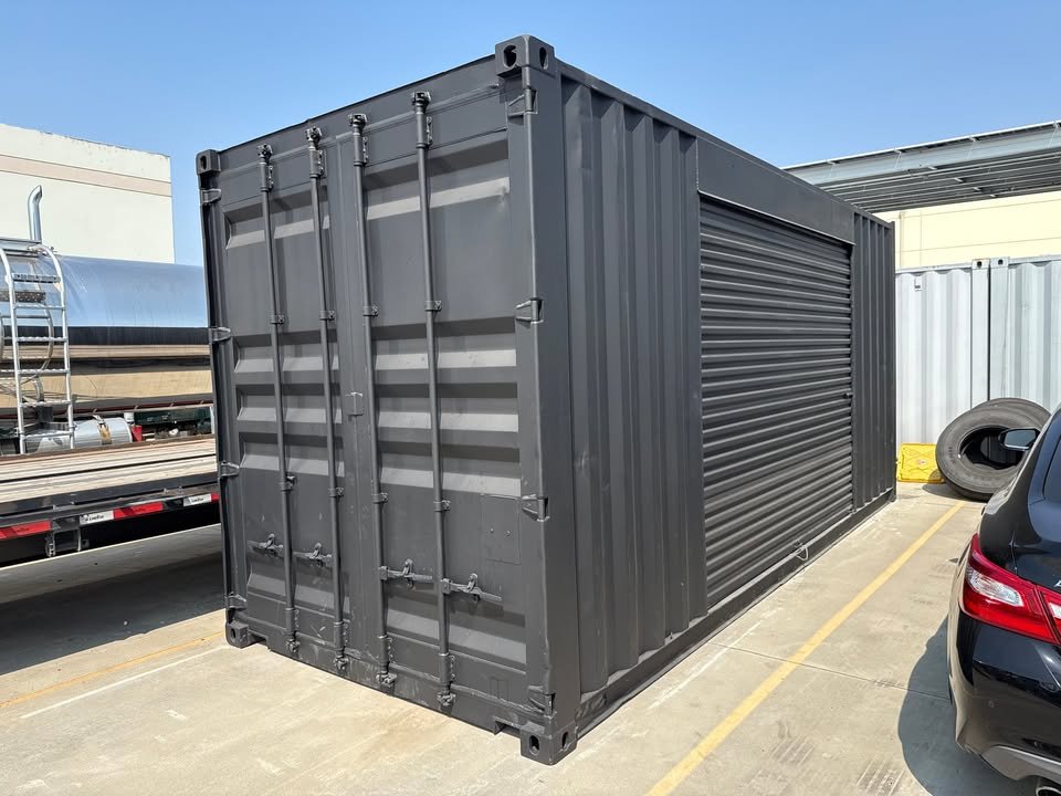 20ft Used Shipping Container – Matte Black w/ 12’ Side Roll-Up Door