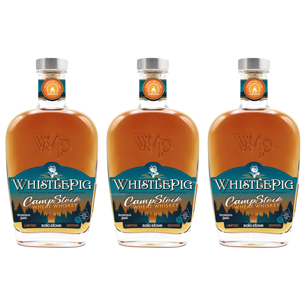 Product image showcasing three identical WhistlePig CampStock Wheat Whiskey bottles, displaying rich amber liquid and a distinctive blue and green label with a forest silhouette and a pig character, emphasizing "Finished in Solo Stove Toasted Barrels" and "Limited Solo Stove Edition" with "Smokeless Toast" text on a clean white background